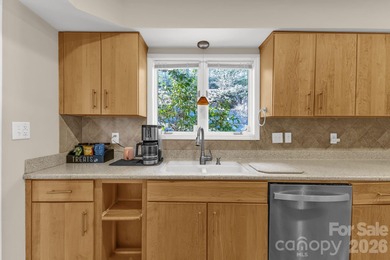 Wake up each day to breathtaking long-range mountain views and on High Vista Country Club in North Carolina - for sale on GolfHomes.com, golf home, golf lot