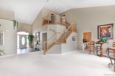Situated on a prime lot in the exclusive Orchards Golf Course on The Orchards Golf Club in Michigan - for sale on GolfHomes.com, golf home, golf lot
