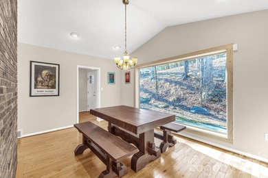 Wake up each day to breathtaking long-range mountain views and on High Vista Country Club in North Carolina - for sale on GolfHomes.com, golf home, golf lot