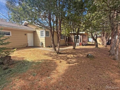 Enjoy the benefits of one-level living in this 3 bedroom, 2 bath on Pine Grove Country Club in Michigan - for sale on GolfHomes.com, golf home, golf lot
