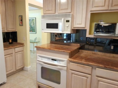 PRICE REDUCTION!  Stunning Wild Oak Bay Villa with Exceptional on IMG Academies Golf and Country Club in Florida - for sale on GolfHomes.com, golf home, golf lot