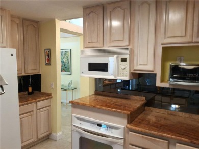 PRICE REDUCTION!  Stunning Wild Oak Bay Villa with Exceptional on IMG Academies Golf and Country Club in Florida - for sale on GolfHomes.com, golf home, golf lot