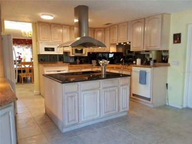 PRICE REDUCTION!  Stunning Wild Oak Bay Villa with Exceptional on IMG Academies Golf and Country Club in Florida - for sale on GolfHomes.com, golf home, golf lot