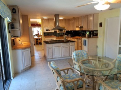 PRICE REDUCTION!  Stunning Wild Oak Bay Villa with Exceptional on IMG Academies Golf and Country Club in Florida - for sale on GolfHomes.com, golf home, golf lot