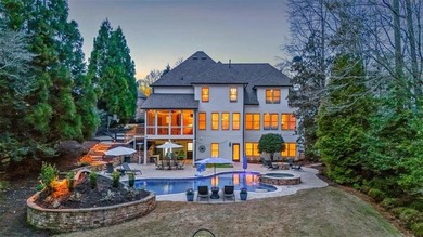 This stunning luxury home at 4027 Hickory Fairway Drive on The Golf Club At Bradshaw Farm in Georgia - for sale on GolfHomes.com, golf home, golf lot
