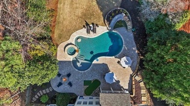 This stunning luxury home at 4027 Hickory Fairway Drive on The Golf Club At Bradshaw Farm in Georgia - for sale on GolfHomes.com, golf home, golf lot