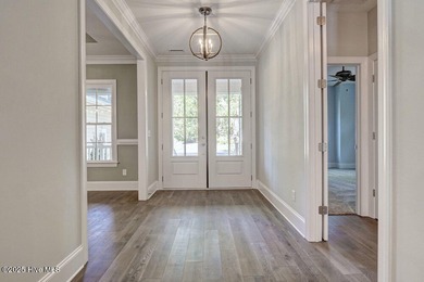 This beautiful 3BR/3.5BA custom built home by Greenwatch on Lockwood Folly Country Club in North Carolina - for sale on GolfHomes.com, golf home, golf lot