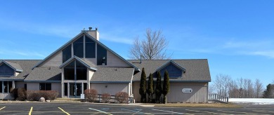 ''Enjoy approximately 300 feet of private lake access complete on Pine View Highlands Golf Course in Michigan - for sale on GolfHomes.com, golf home, golf lot