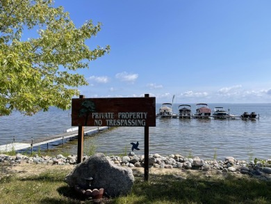 ''Enjoy approximately 300 feet of private lake access complete on Pine View Highlands Golf Course in Michigan - for sale on GolfHomes.com, golf home, golf lot
