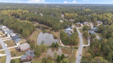 The best of both worlds! Family time downstairs & a bonus room on Anderson Creek Golf Club in North Carolina - for sale on GolfHomes.com, golf home, golf lot