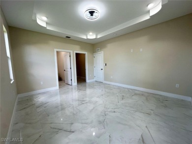 Stunning new construction home in the fast-growing and vibrant on River Hall Country Club in Florida - for sale on GolfHomes.com, golf home, golf lot
