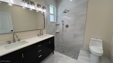 Stunning new construction home in the fast-growing and vibrant on River Hall Country Club in Florida - for sale on GolfHomes.com, golf home, golf lot