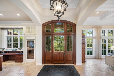 Experience Ultra-Luxury in This Sprawling Single Story Estate at on Old Marsh Golf Club in Florida - for sale on GolfHomes.com, golf home, golf lot