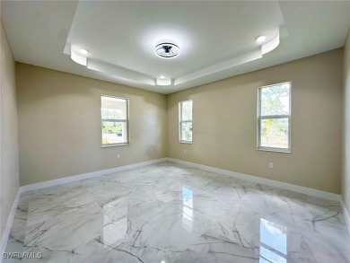 Stunning new construction home in the fast-growing and vibrant on River Hall Country Club in Florida - for sale on GolfHomes.com, golf home, golf lot