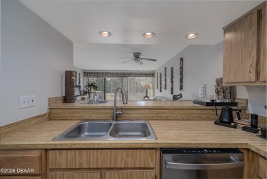 Tucked inside one of the area's most sought-after golf on Sugar Mill Country Club in Florida - for sale on GolfHomes.com, golf home, golf lot