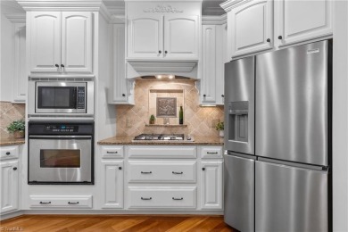 This corner lot home, built by award winning builder Alan on Oak Valley Golf Club in North Carolina - for sale on GolfHomes.com, golf home, golf lot
