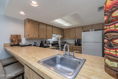 Tucked inside one of the area's most sought-after golf on Sugar Mill Country Club in Florida - for sale on GolfHomes.com, golf home, golf lot