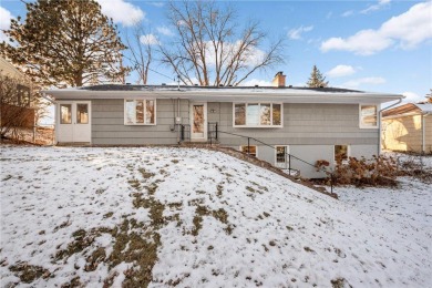 Welcome to this sweet mid century rambler, perfectly situated in on Meadowbrook Golf Course in Minnesota - for sale on GolfHomes.com, golf home, golf lot