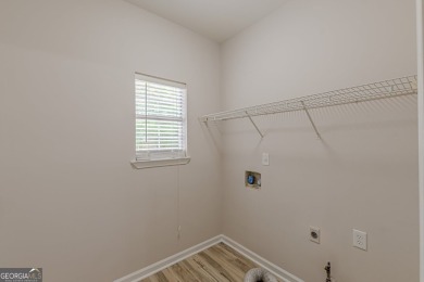 Freshly Renovated 3 Bedroom/2 Bathroom Home perched up high on 2 on Lake Spivey Golf Club in Georgia - for sale on GolfHomes.com, golf home, golf lot