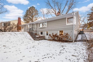 Welcome to this sweet mid century rambler, perfectly situated in on Meadowbrook Golf Course in Minnesota - for sale on GolfHomes.com, golf home, golf lot