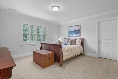 This corner lot home, built by award winning builder Alan on Oak Valley Golf Club in North Carolina - for sale on GolfHomes.com, golf home, golf lot