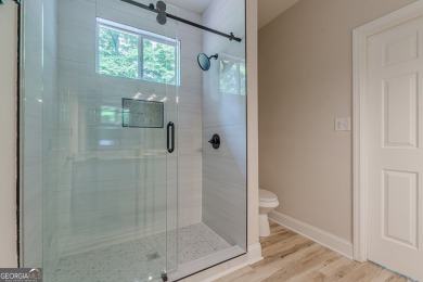 Freshly Renovated 3 Bedroom/2 Bathroom Home perched up high on 2 on Lake Spivey Golf Club in Georgia - for sale on GolfHomes.com, golf home, golf lot