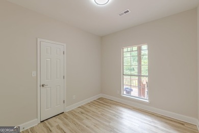Freshly Renovated 3 Bedroom/2 Bathroom Home perched up high on 2 on Lake Spivey Golf Club in Georgia - for sale on GolfHomes.com, golf home, golf lot