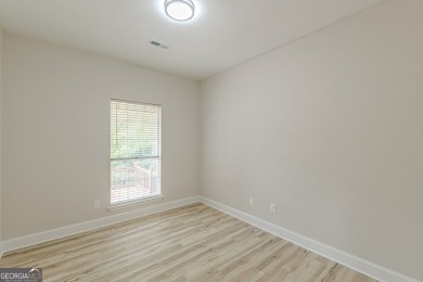 Freshly Renovated 3 Bedroom/2 Bathroom Home perched up high on 2 on Lake Spivey Golf Club in Georgia - for sale on GolfHomes.com, golf home, golf lot
