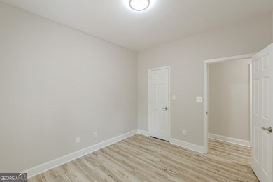 Freshly Renovated 3 Bedroom/2 Bathroom Home perched up high on 2 on Lake Spivey Golf Club in Georgia - for sale on GolfHomes.com, golf home, golf lot