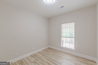 Freshly Renovated 3 Bedroom/2 Bathroom Home perched up high on 2 on Lake Spivey Golf Club in Georgia - for sale on GolfHomes.com, golf home, golf lot