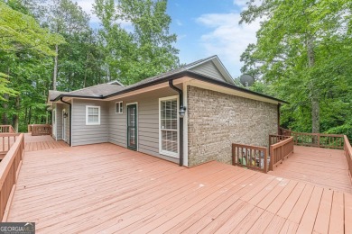 Freshly Renovated 3 Bedroom/2 Bathroom Home perched up high on 2 on Lake Spivey Golf Club in Georgia - for sale on GolfHomes.com, golf home, golf lot