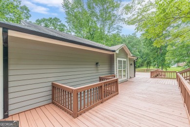 Freshly Renovated 3 Bedroom/2 Bathroom Home perched up high on 2 on Lake Spivey Golf Club in Georgia - for sale on GolfHomes.com, golf home, golf lot