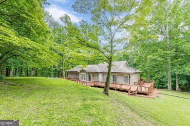 Freshly Renovated 3 Bedroom/2 Bathroom Home perched up high on 2 on Lake Spivey Golf Club in Georgia - for sale on GolfHomes.com, golf home, golf lot