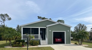 Indulge in the pinnacle of luxurious living within this on Blue Heron Pines Golf Course in Florida - for sale on GolfHomes.com, golf home, golf lot