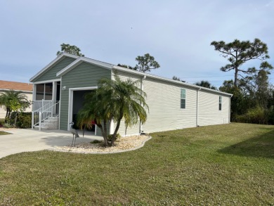 Indulge in the pinnacle of luxurious living within this on Blue Heron Pines Golf Course in Florida - for sale on GolfHomes.com, golf home, golf lot