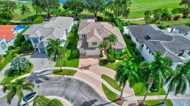 Experience luxury living in this exquisite 5-bedroom, 5-bathroom on Mizner Country Club in Florida - for sale on GolfHomes.com, golf home, golf lot