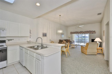 This charming 2-bedroom, 2-bathroom villa offers a serene and on Scepter Golf Club in Florida - for sale on GolfHomes.com, golf home, golf lot