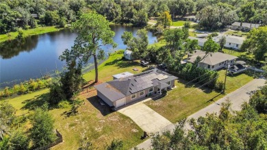 Check out this LAKEFRONT, charming ranch style 2 bedroom, 2 bath on DeBary Golf and Country Club in Florida - for sale on GolfHomes.com, golf home, golf lot