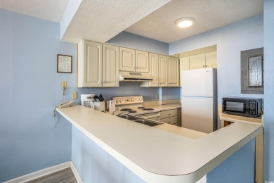 This a sun-filled, 2-bedroom, 2-bath oceanfront condo located on on The Dunes Golf and Beach Club in South Carolina - for sale on GolfHomes.com, golf home, golf lot