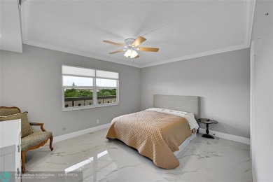 THIS BEAUTIFULLY REDESIGNED AND CRAFTED CONDO. It is a stunning on Wynmoor Golf Course in Florida - for sale on GolfHomes.com, golf home, golf lot