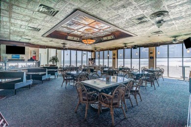 This a sun-filled, 2-bedroom, 2-bath oceanfront condo located on on The Dunes Golf and Beach Club in South Carolina - for sale on GolfHomes.com, golf home, golf lot