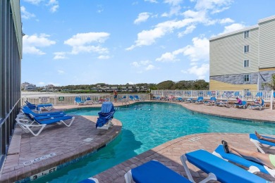 This a sun-filled, 2-bedroom, 2-bath oceanfront condo located on on The Dunes Golf and Beach Club in South Carolina - for sale on GolfHomes.com, golf home, golf lot