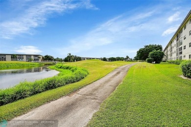 THIS BEAUTIFULLY REDESIGNED AND CRAFTED CONDO. It is a stunning on Wynmoor Golf Course in Florida - for sale on GolfHomes.com, golf home, golf lot