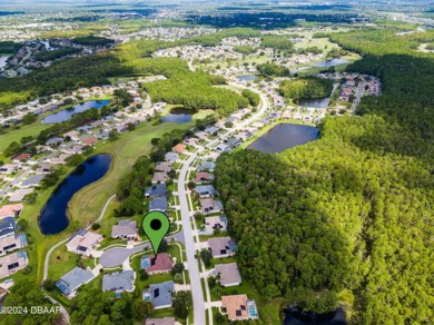 This exquisite three-bedroom, two-bathroom pool home, complete on The Golf Club At Cypress Head in Florida - for sale on GolfHomes.com, golf home, golf lot