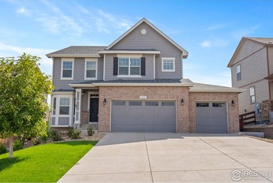 Discover this stunning 5-bedroom, 5-bath, 2-story home with a on Pelican Lakes Golf and Country Club in Colorado - for sale on GolfHomes.com, golf home, golf lot