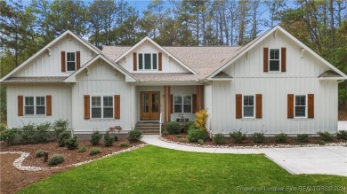 Welcome to this stunning, modern home located in the highly on Pinewild Country Club of Pinehurst in North Carolina - for sale on GolfHomes.com, golf home, golf lot