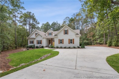 Welcome to this stunning, modern home located in the highly on Pinewild Country Club of Pinehurst in North Carolina - for sale on GolfHomes.com, golf home, golf lot