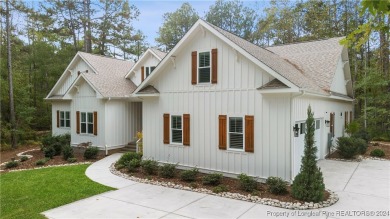 Welcome to this stunning, modern home located in the highly on Pinewild Country Club of Pinehurst in North Carolina - for sale on GolfHomes.com, golf home, golf lot