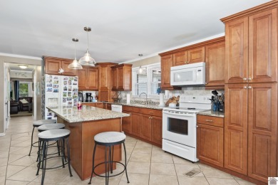 This private *WATERFRONT OASIS OVERLOOKING LAKE BARKLEY* awaits on Boots Randolph Golf Course in Kentucky - for sale on GolfHomes.com, golf home, golf lot