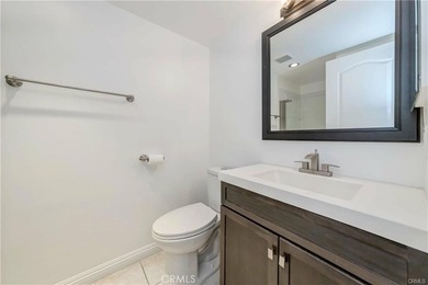 Welcome to this beautifully updated home nestled in the heart of on Bixby Village Golf Course in California - for sale on GolfHomes.com, golf home, golf lot